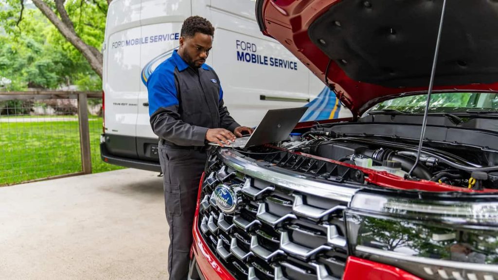 Rogers Ford mobile service van parked in a driveway in Midland, TX